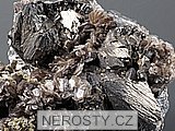 arzenopyrit + muskovit + siderit