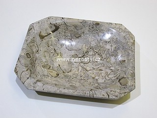 v�penec s fos�liemi + hranat� tal��ek